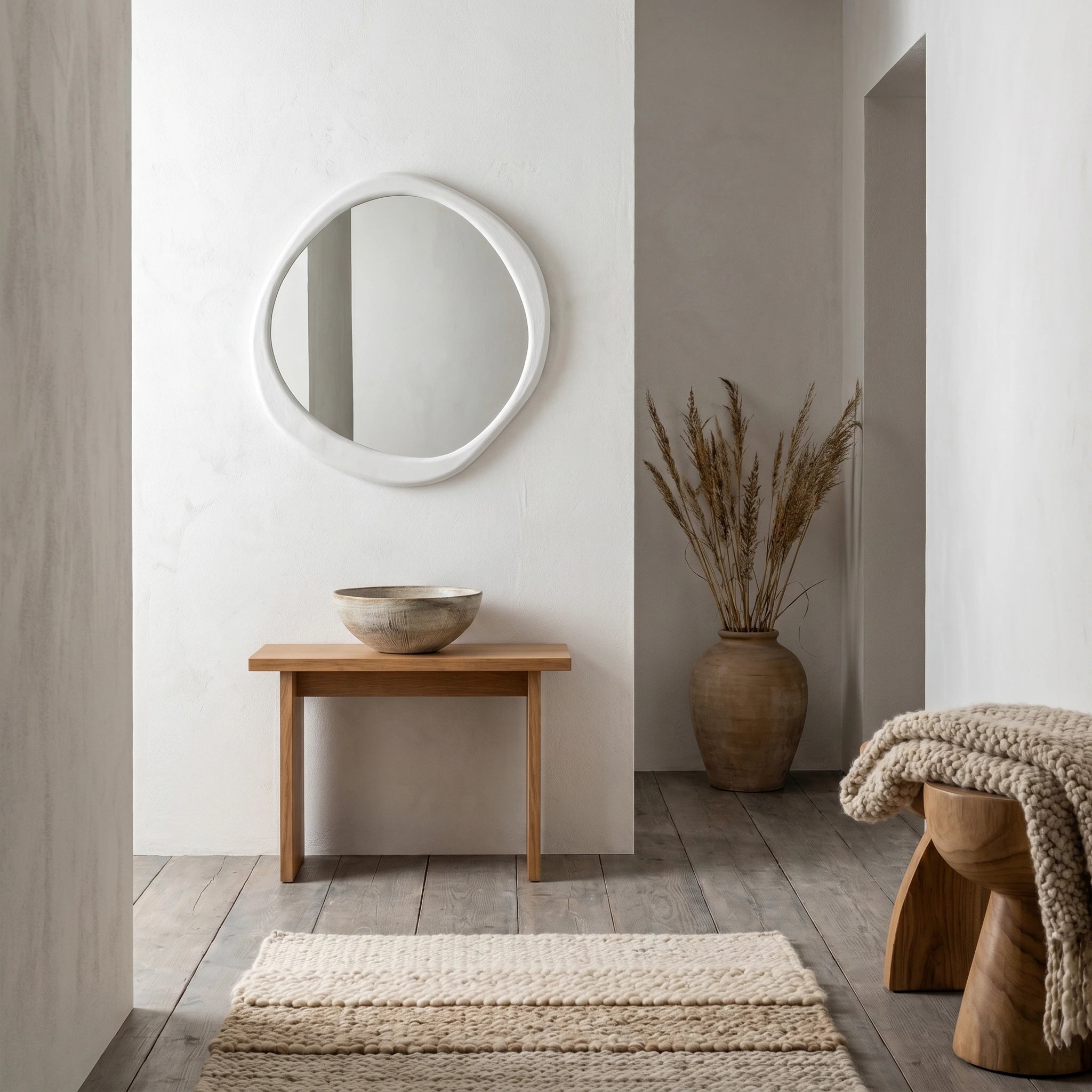 CASA Organic round wall mirror with concrete effect irregular frame