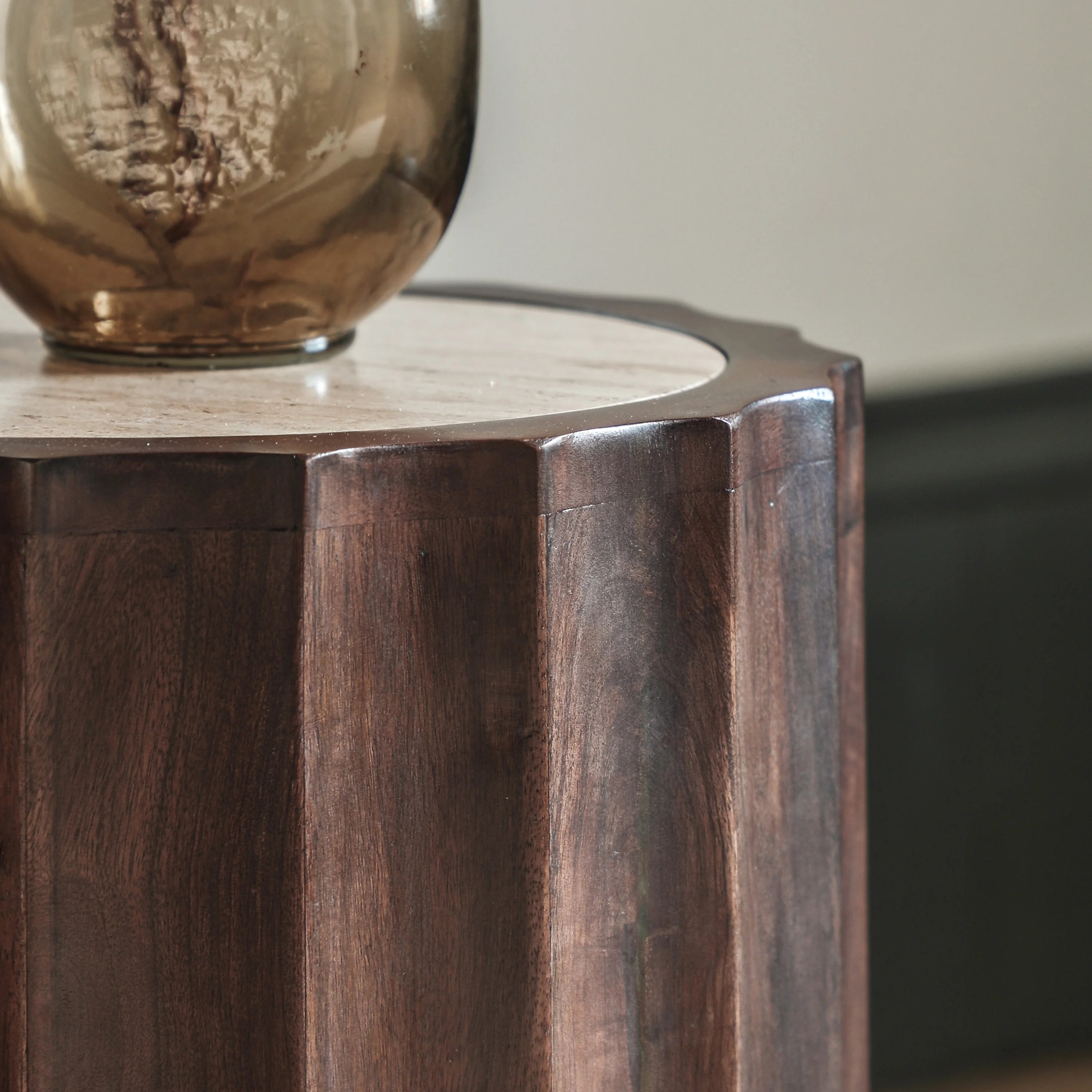 Cascia Round Dark Carved Mango Wood Bedside Table with Travertine Top – 40cm