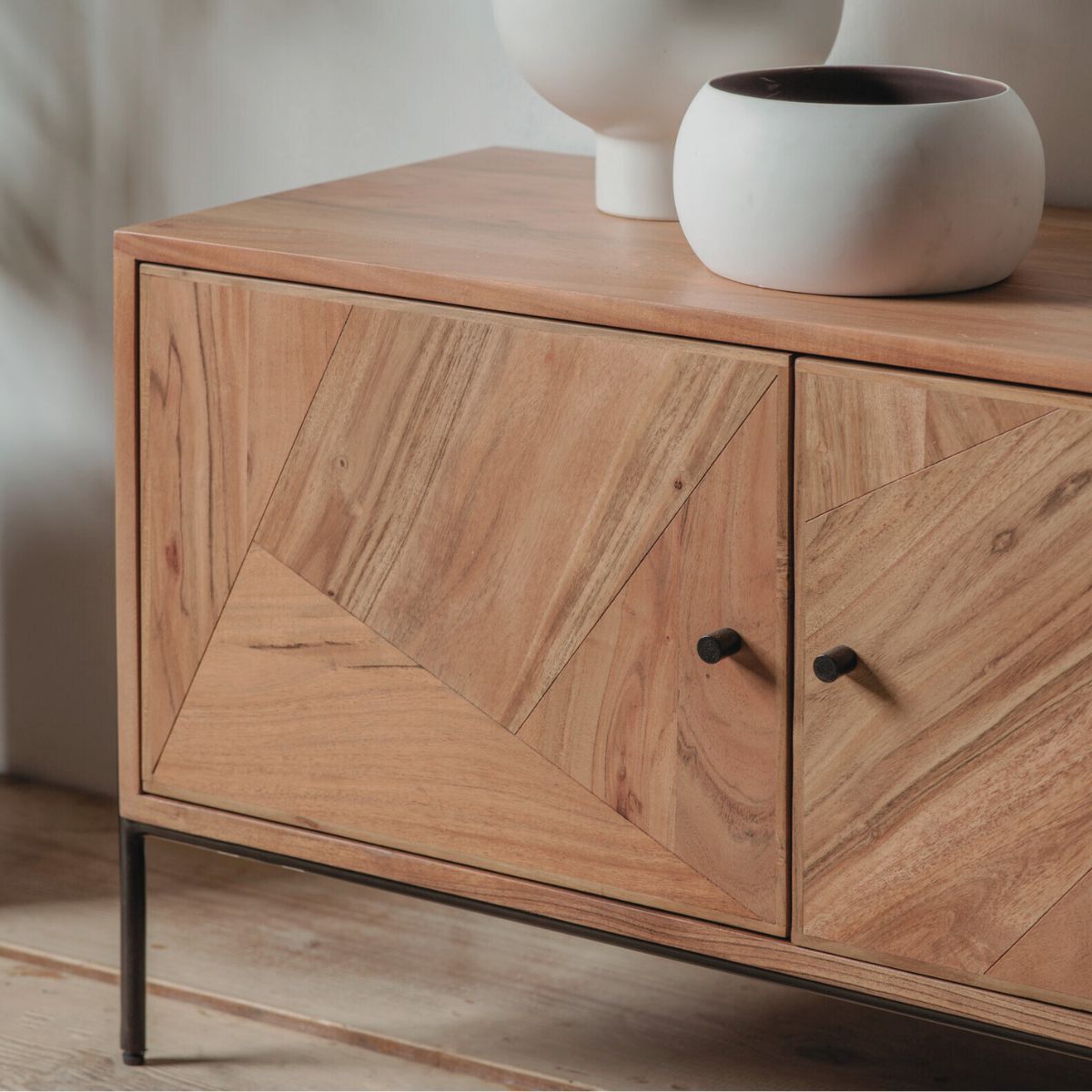 Lunde acacia wood media unit with four doors and black iron legs | malletandplane.com