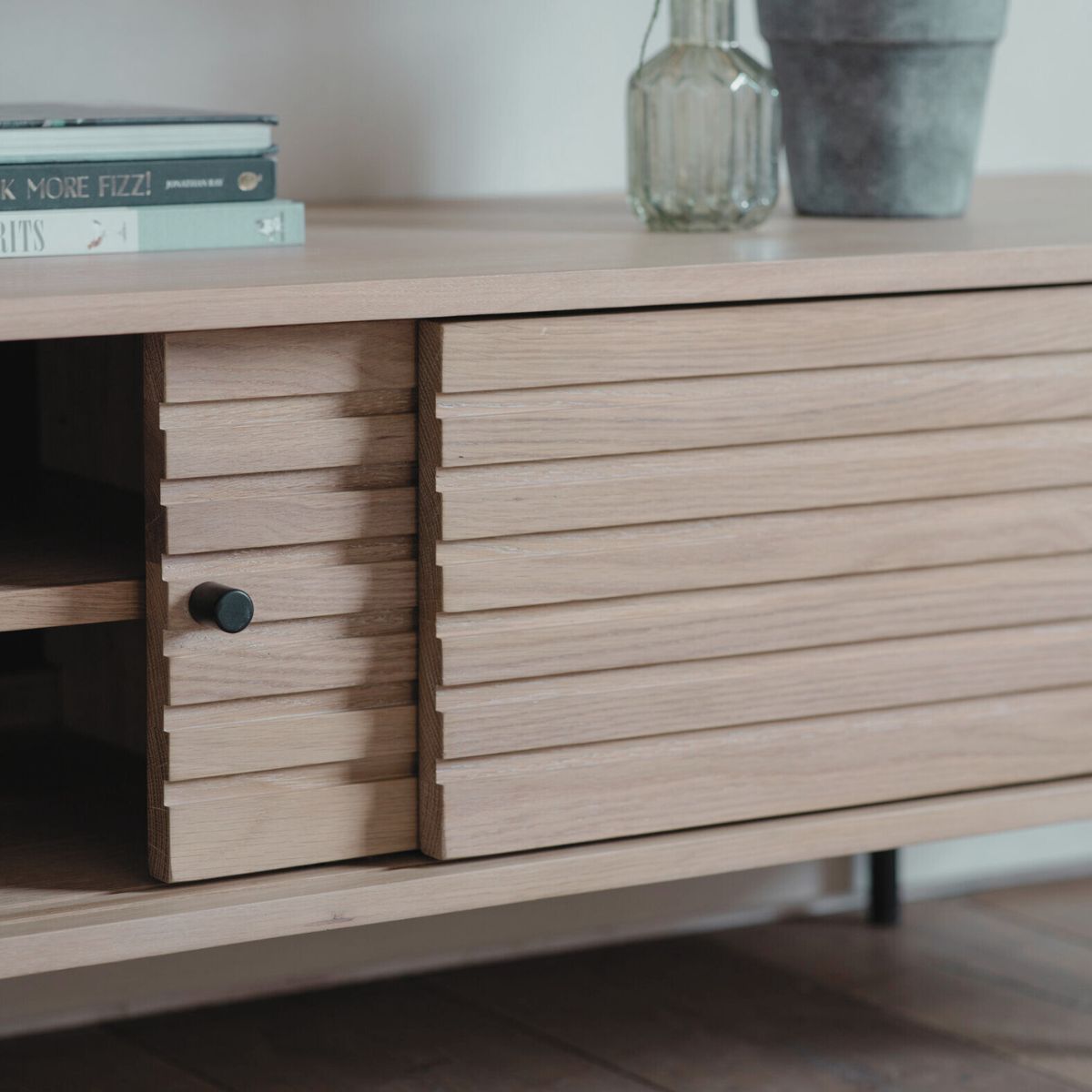 OKAYAMA oak and steel media unit with sliding doors and Japandi slatted detailing | malletandplane.com