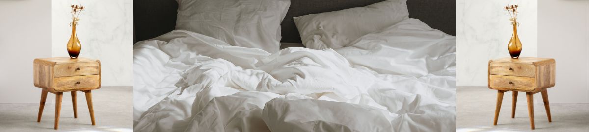 The Power Pair — solid wood bedside tables styled in a calm bedroom setting. Buy any 2 and save £20. A Mallet & Plane exclusive offer celebrating warm Nordic design.