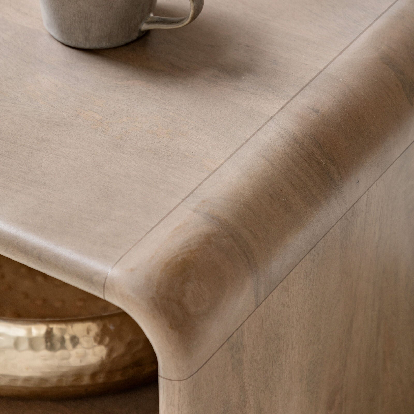 Rocca mango coffee table with curved edges, fluted drawer front and brushed brass hardware | malletandplane.com