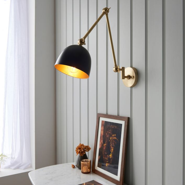 Geiger adjustable wall light in antique brass and matt black | MalletandPlane.com