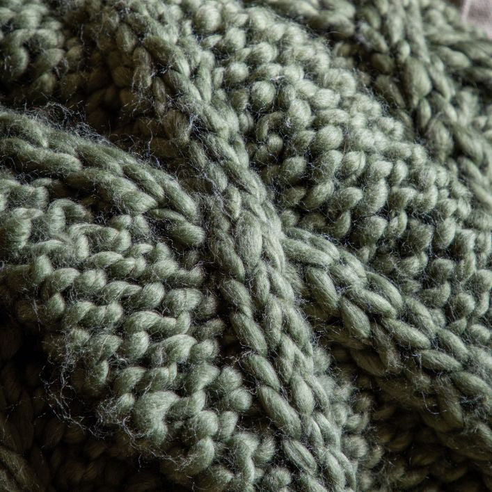 Knitted chunky cable throw in olive green | malletandplane.com