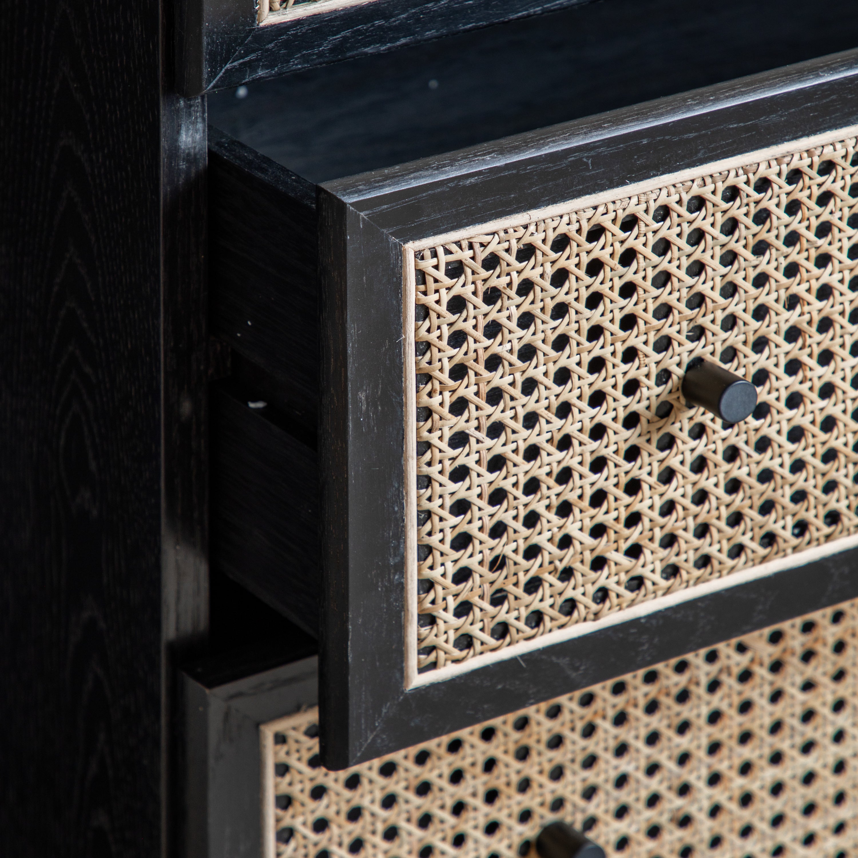 Hoxton Chest of Drawers in black oak with contrasting rattan drawer frontals | MalletandPlane.com