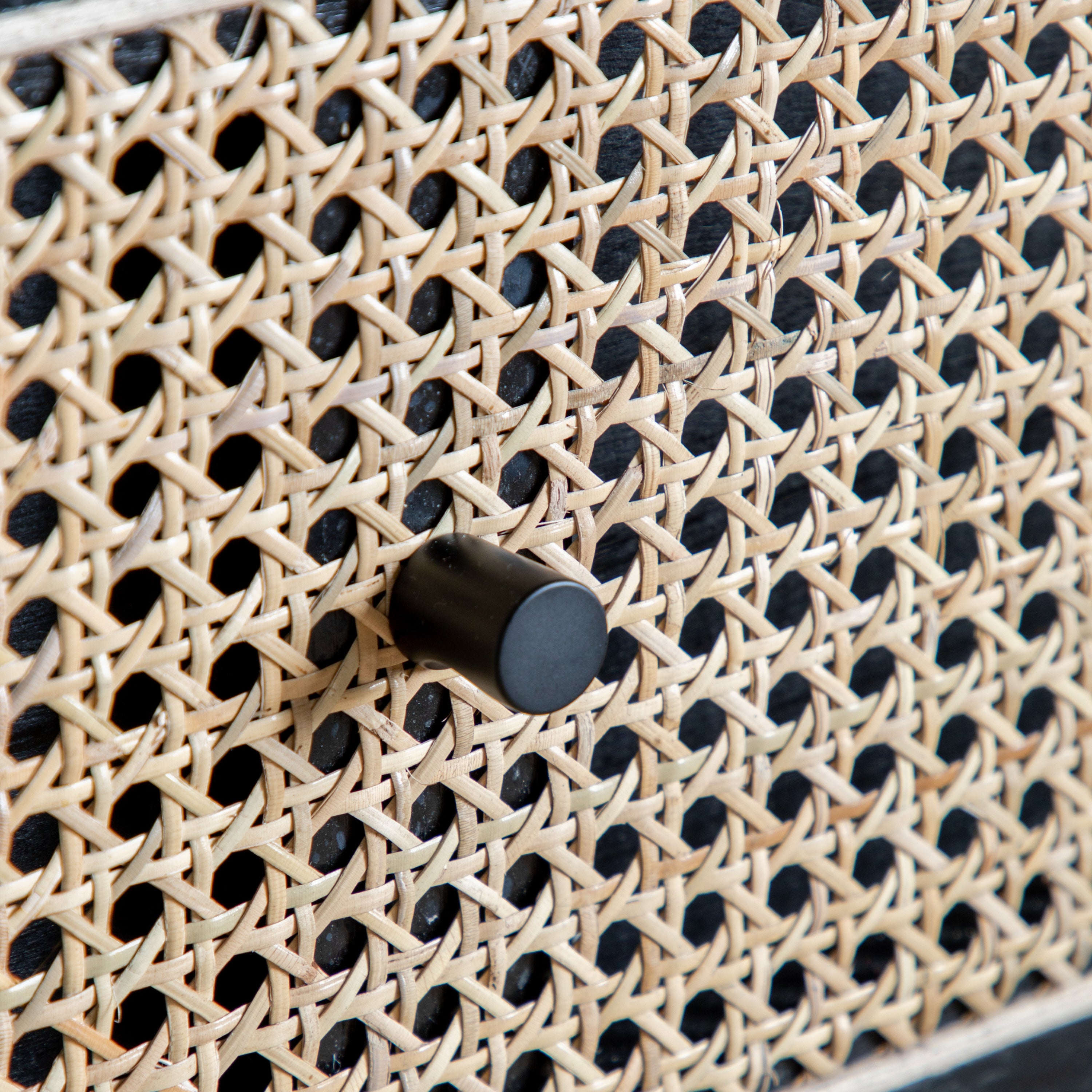 Hoxton Chest of Drawers in black oak with contrasting rattan drawer frontals | MalletandPlane.com