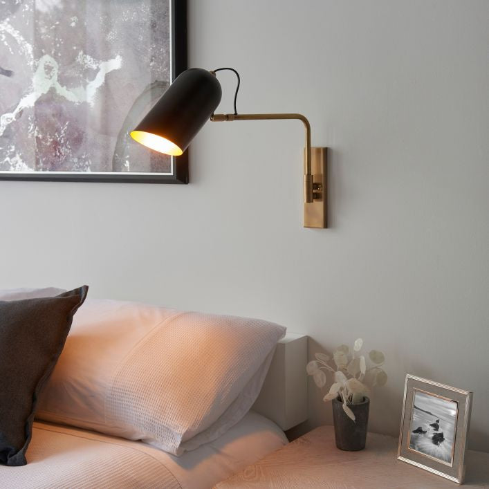 Harry adjustable antique brass and matt black wall light | MalletandPlane.com