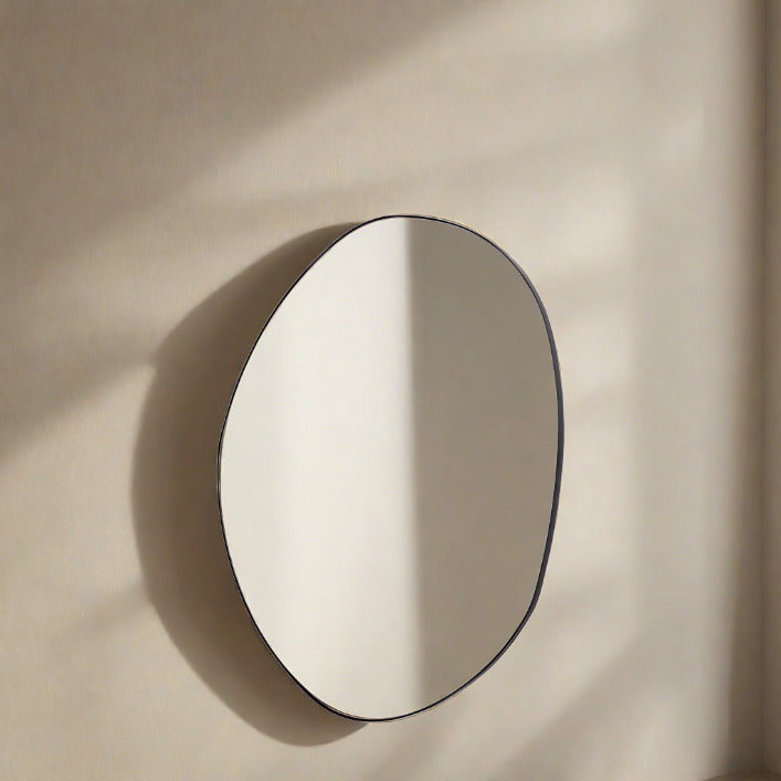 Cornelia medium organic wall mirror with black frame | malletandplane.com