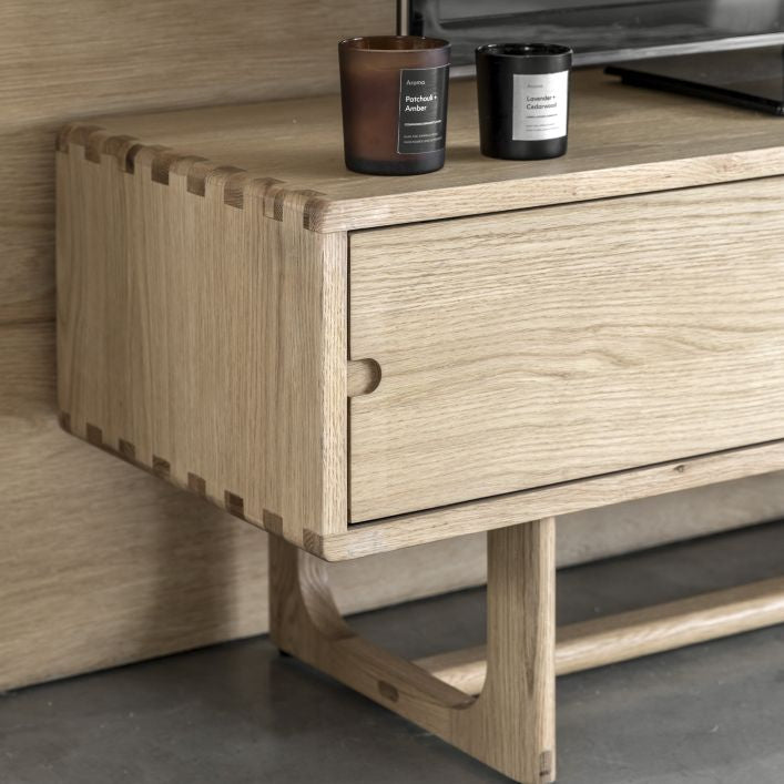 Artisan oak TV stand with 2 sliding doors and featuring cut out handles | malletandplane.com