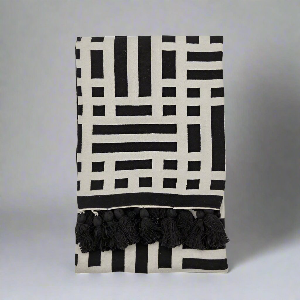 Decor contemporary knitted tassel cotton throw in black or ochre | malletandplane.com