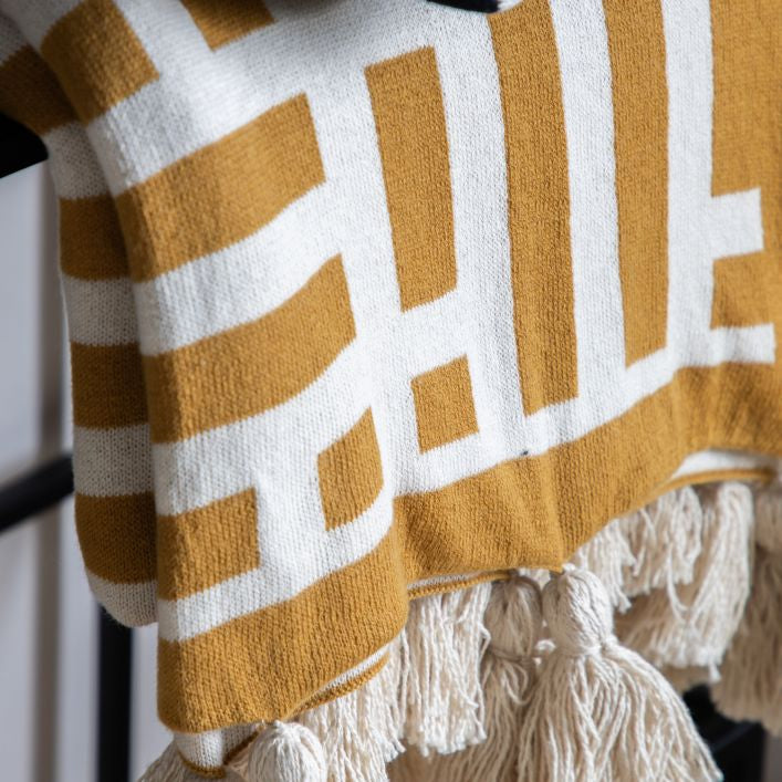 Decor contemporary knitted tassel cotton throw in black or ochre | malletandplane.com