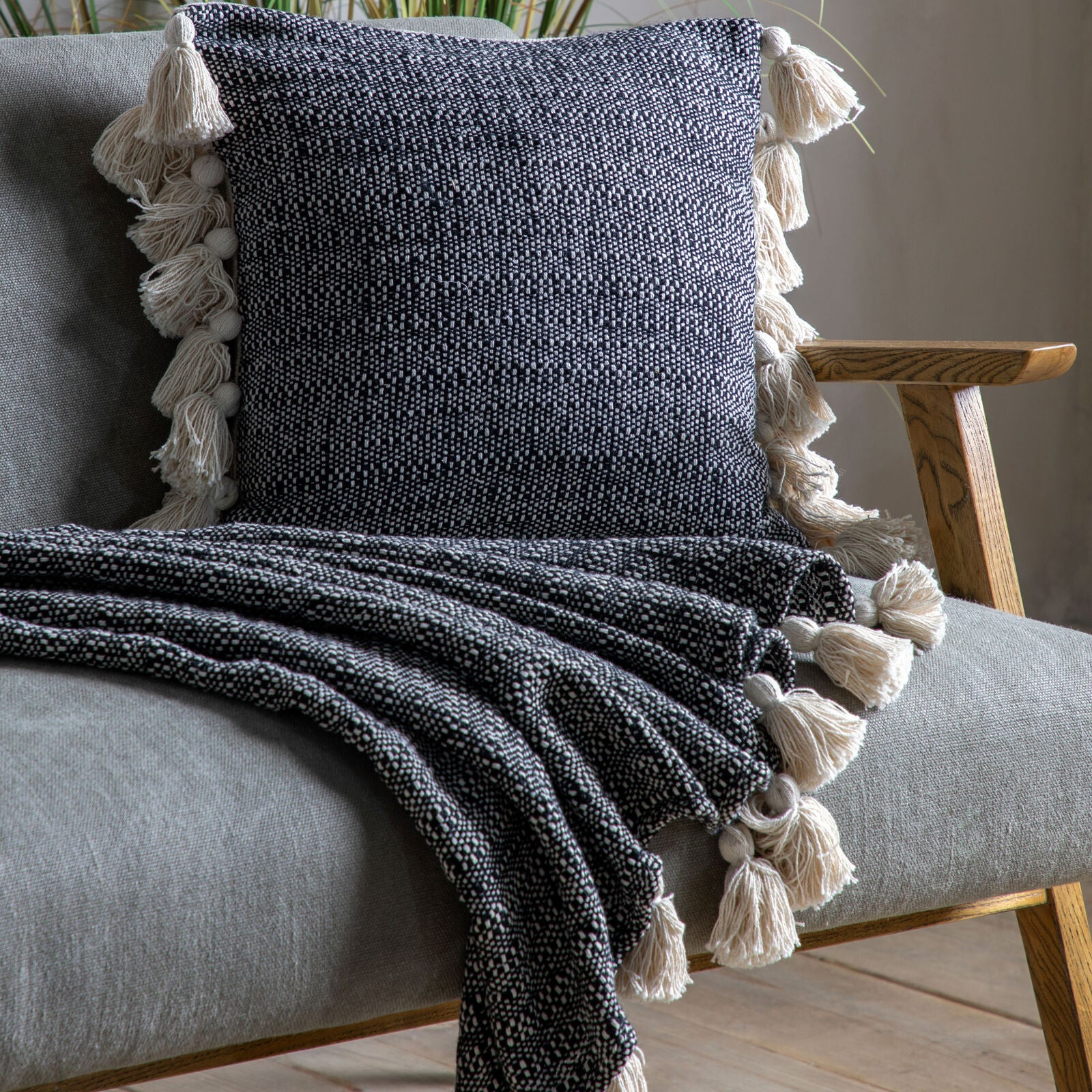 Dustin polycotton tassel throw with woven cream and black pattern | malletandplane.com