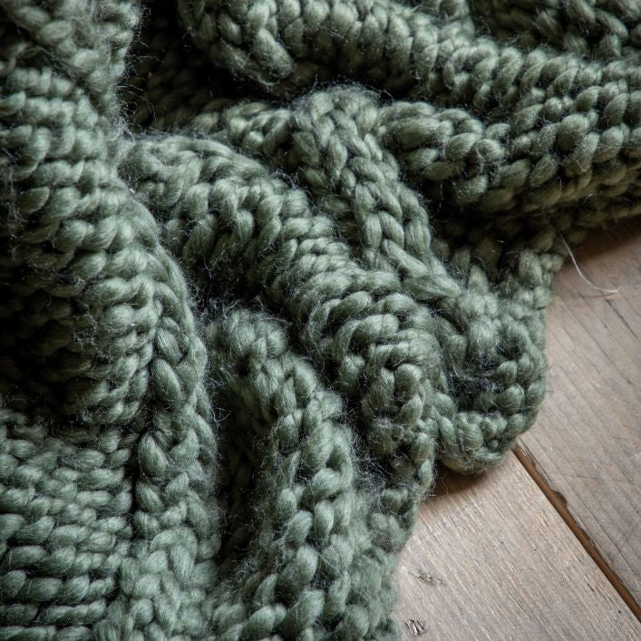 Knitted chunky cable throw in olive green | malletandplane.com