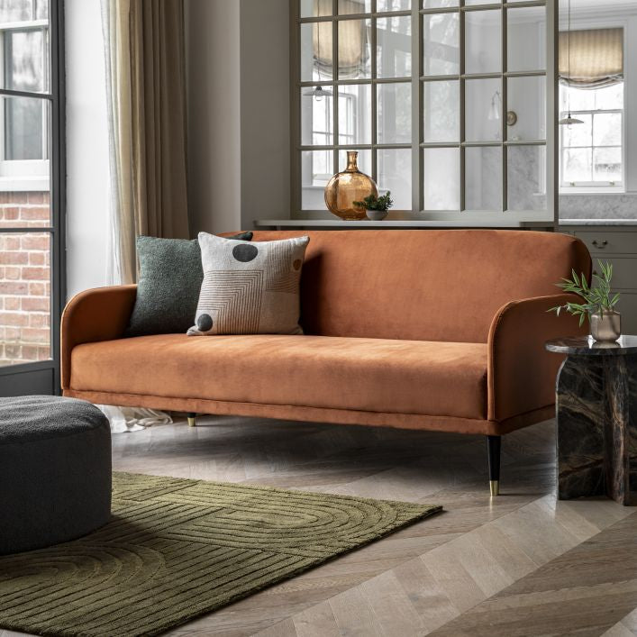 Steve click clack sofa bed in rust, cyan blue, or deep grey upholstery | malletandplane.com