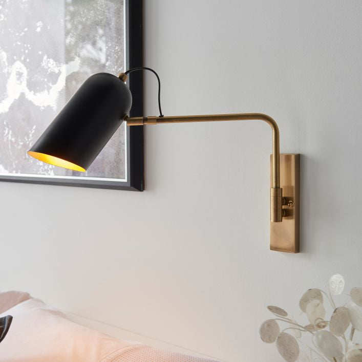 Harry adjustable antique brass and matt black wall light | MalletandPlane.com