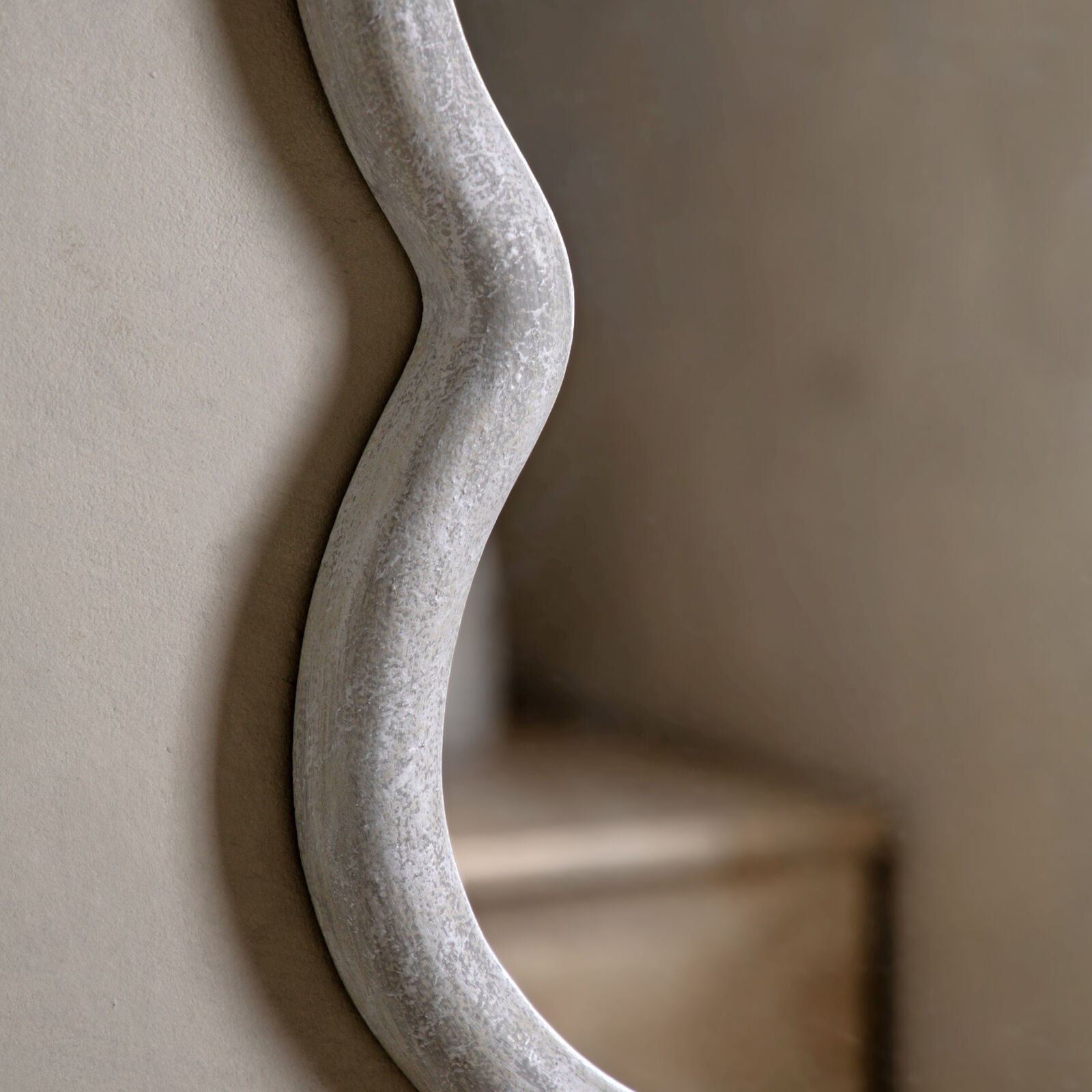 Flow curved wall mirrow with organic curved frame | malletandplane.com