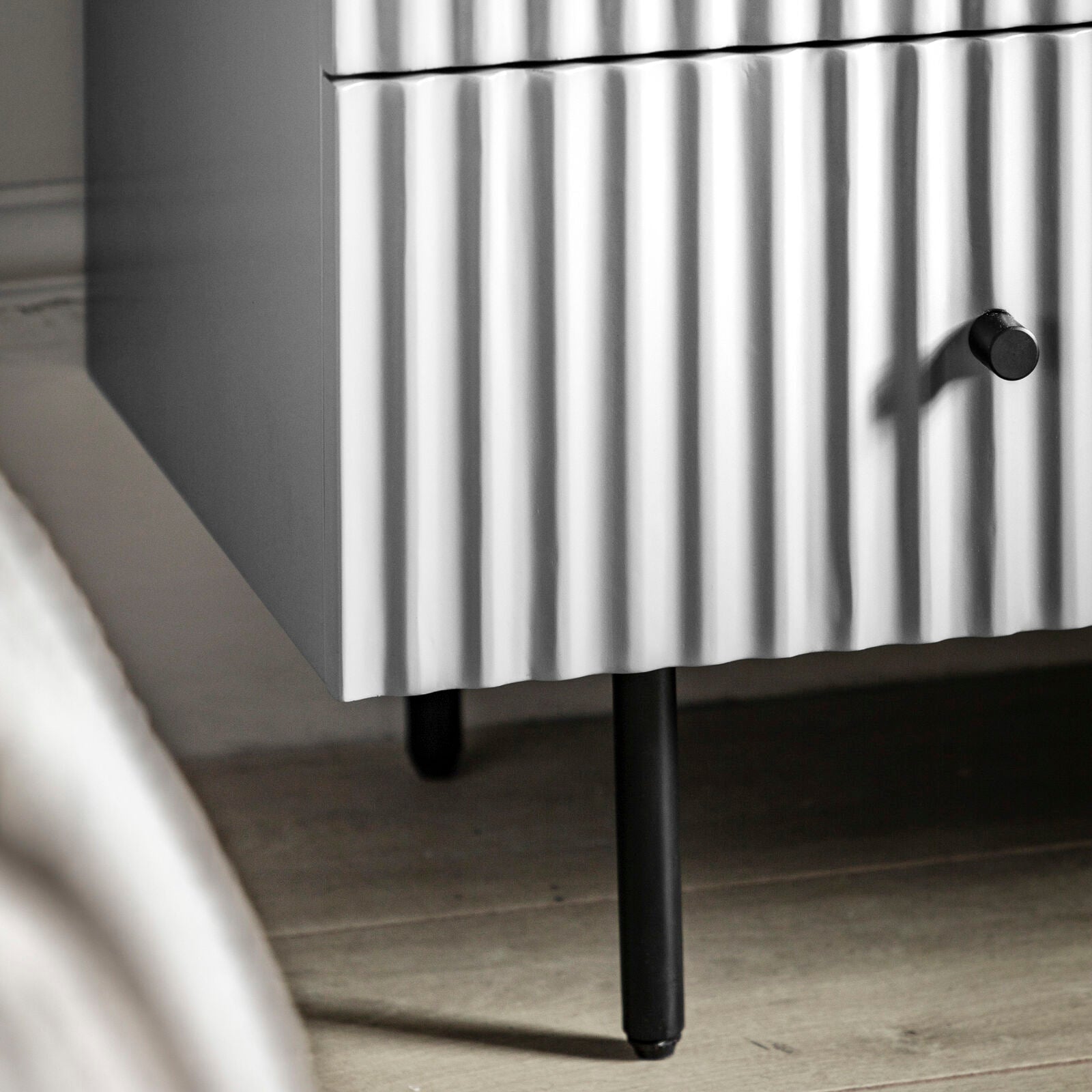 Flute White painted Chest of Drawers with scalloped fascia and black metal underframe | malletandplane.com