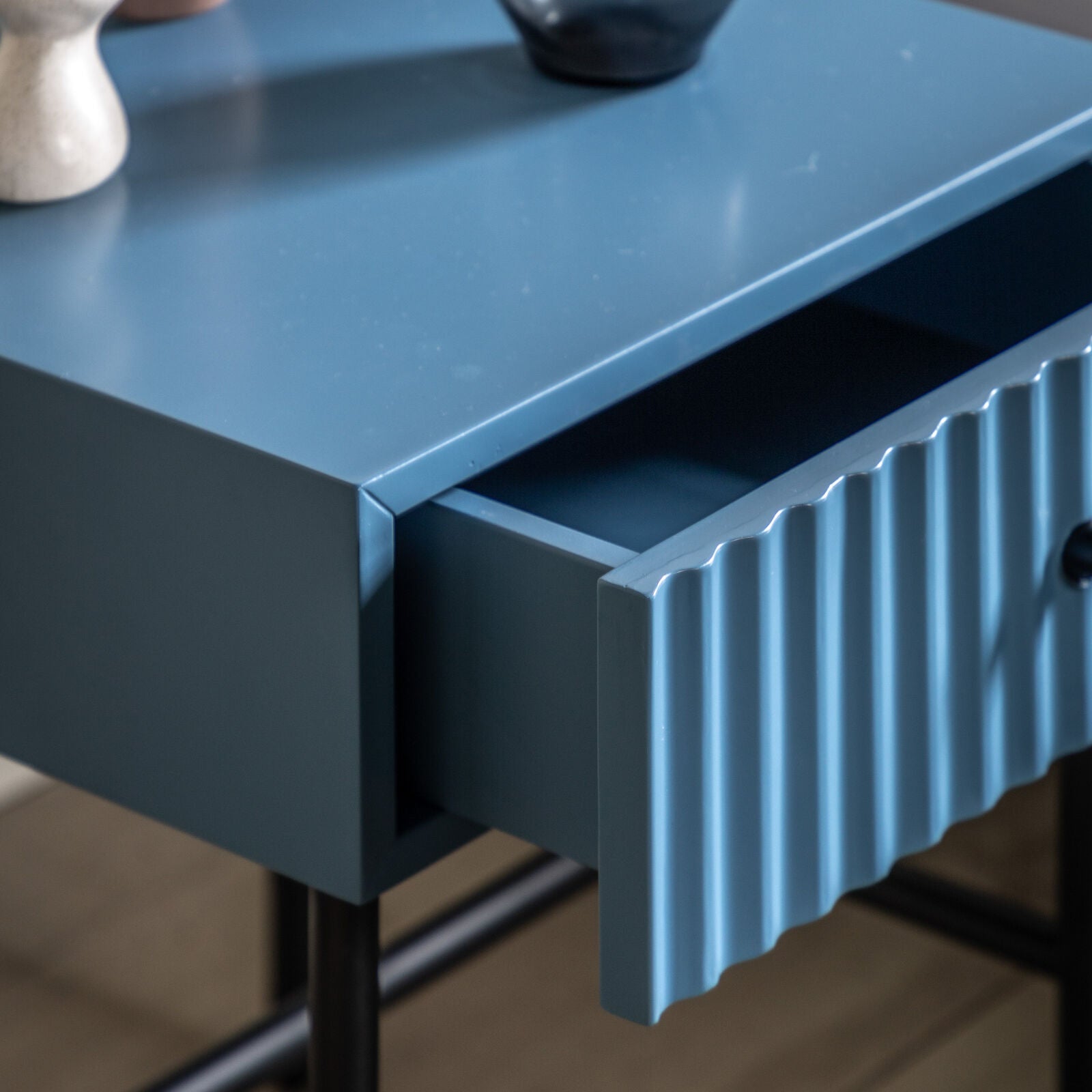 Flute bedside table with drawer in blue finish with scalloped fascia and black metal underframe | malletandplane.com