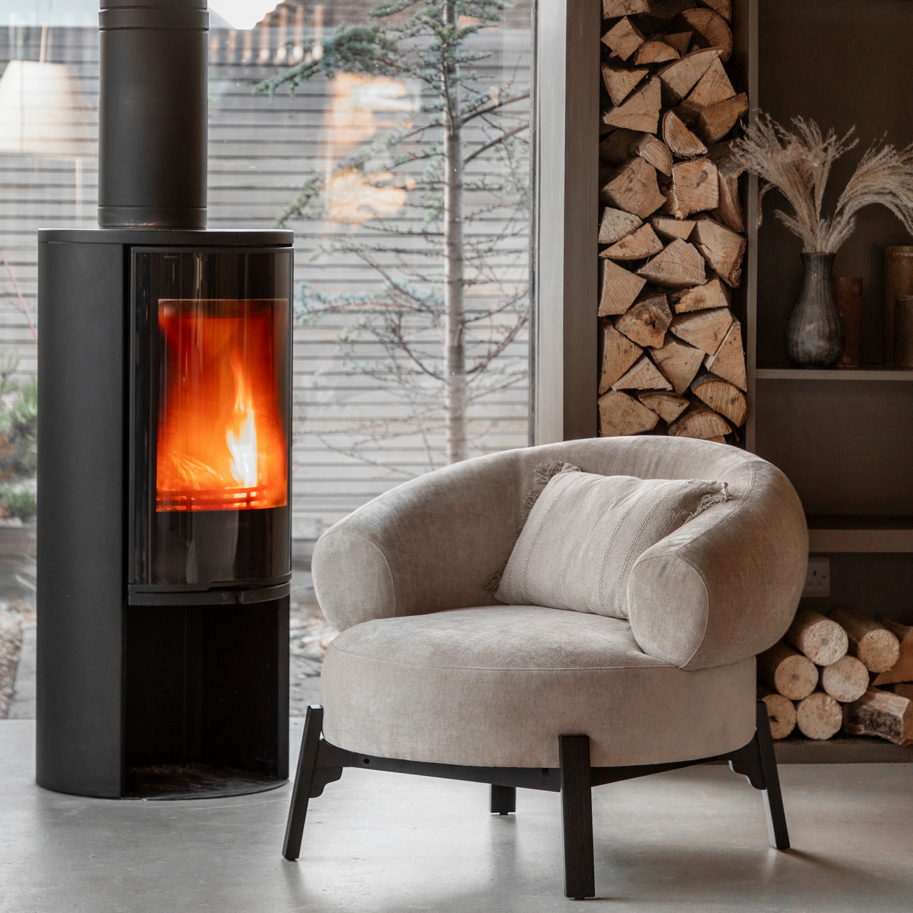 Harvey natural curved armchair with dark wood base frame and legs | malletandplane.com