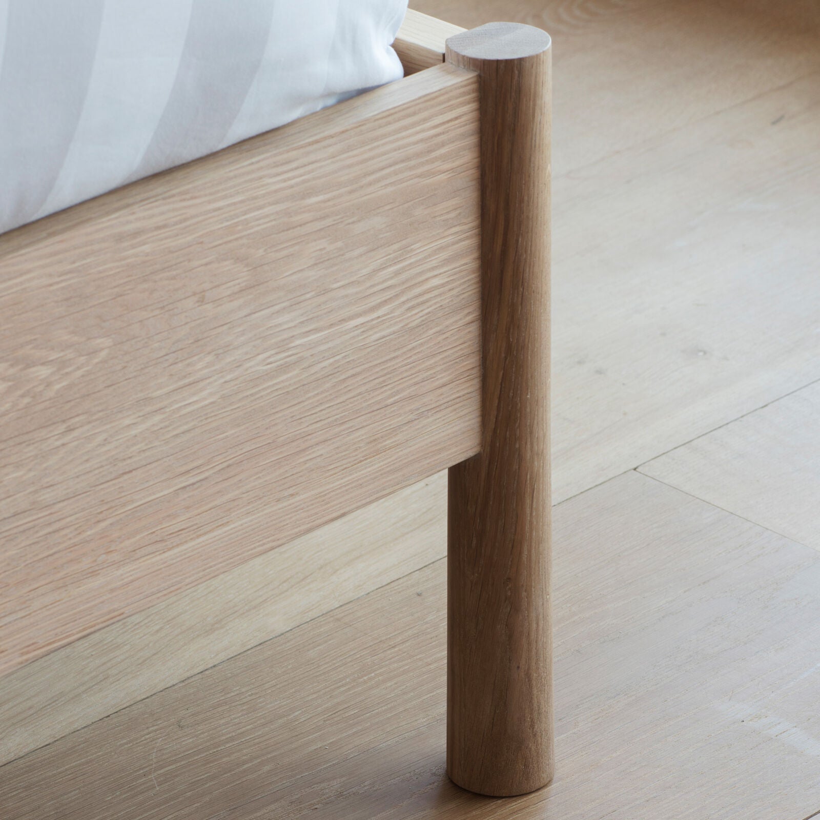 Axel natural oak double bed with spindle details in vernacular style | malletandplane.com