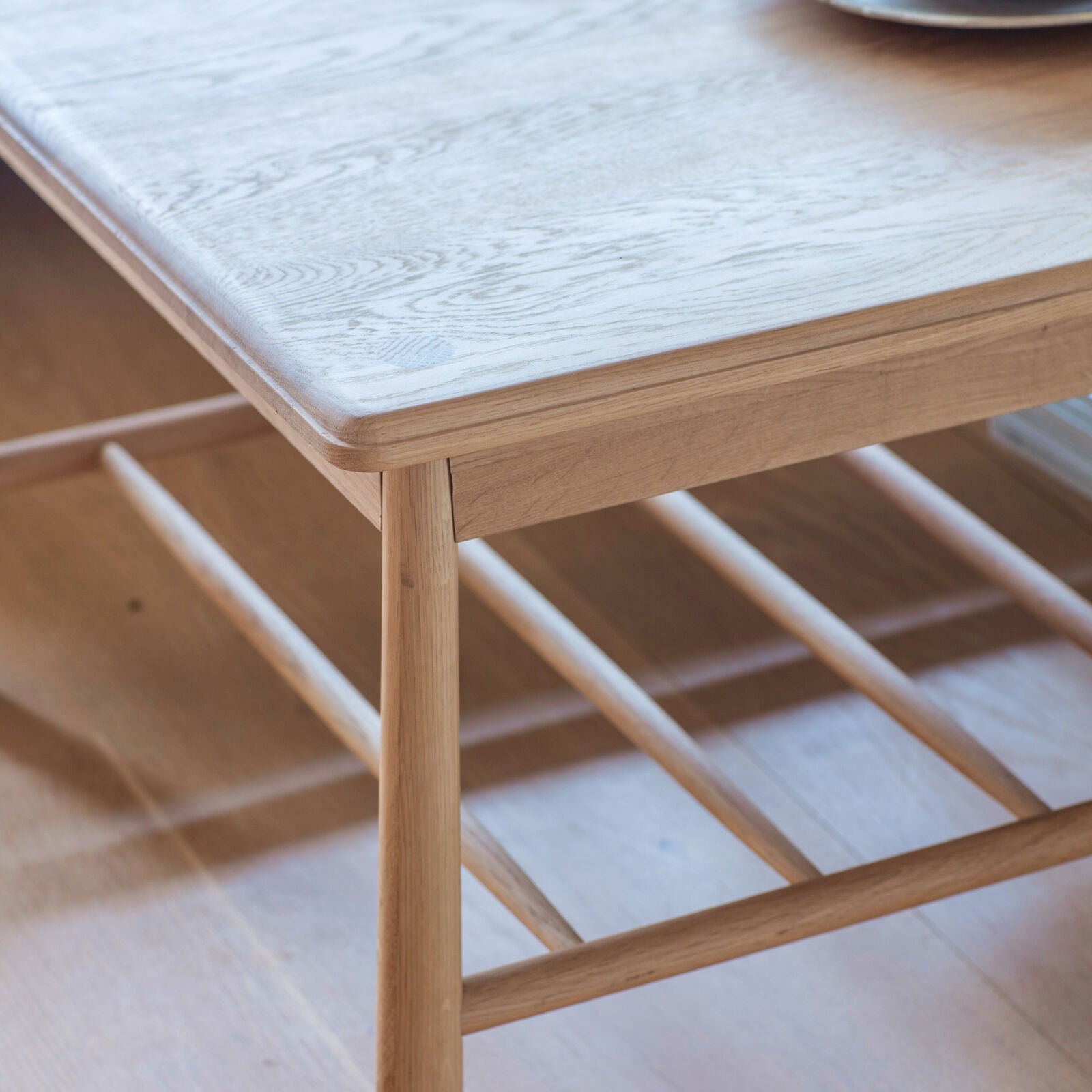 Axel natural oak coffee table with spindle shelf | malletandplane.com