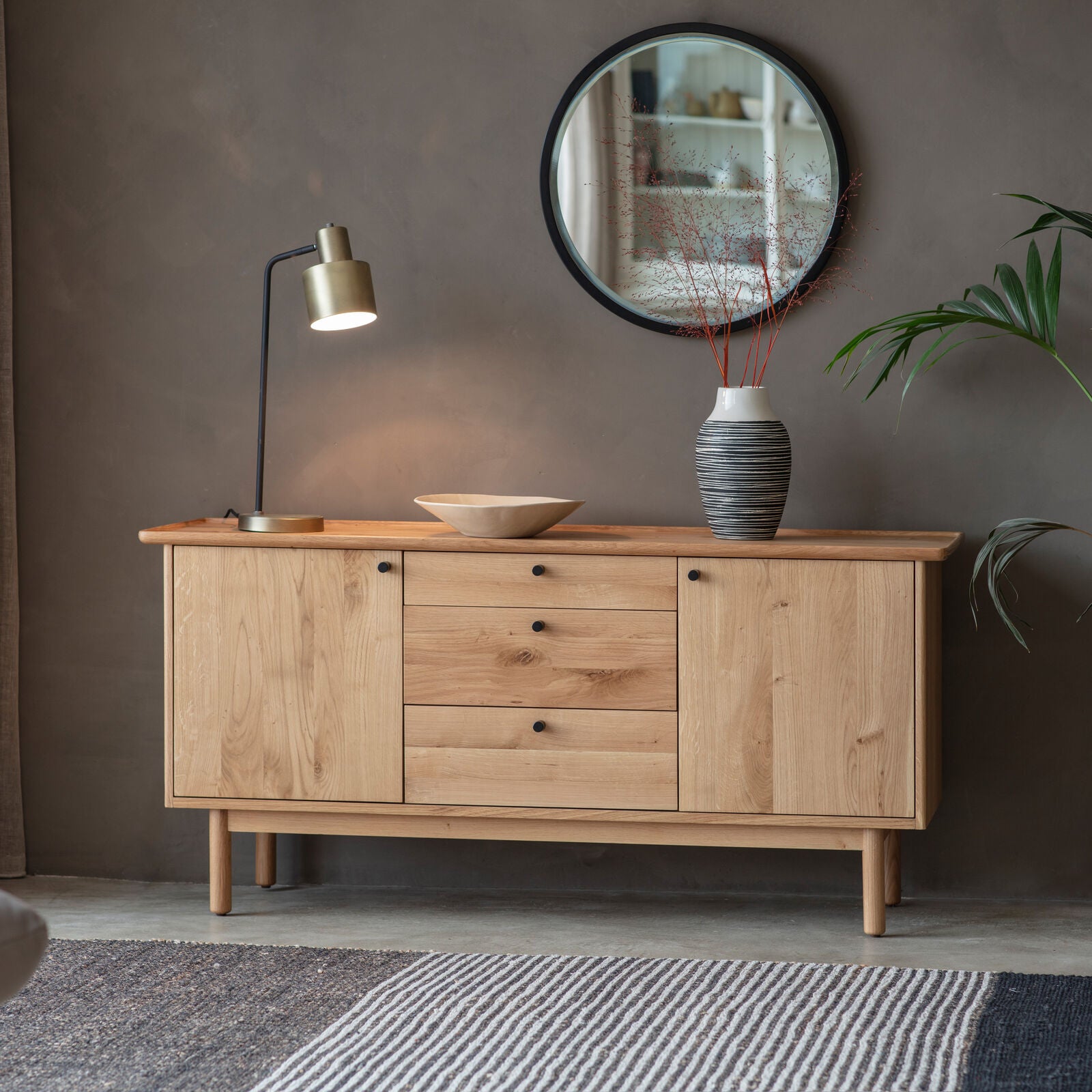 Alfie oak sideboard with 3 drawers and 2 cupboards and a choice of black or natural handles | malletandplane.com