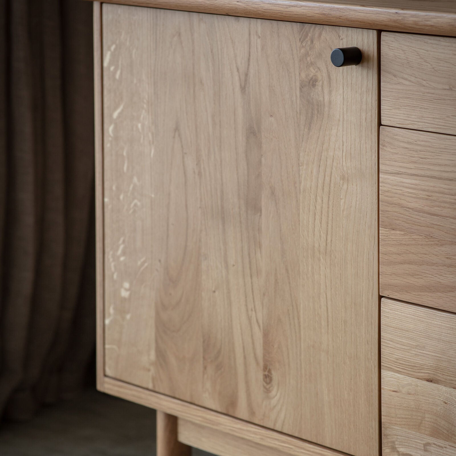 Alfie oak sideboard with 3 drawers and 2 cupboards and a choice of black or natural handles | malletandplane.com