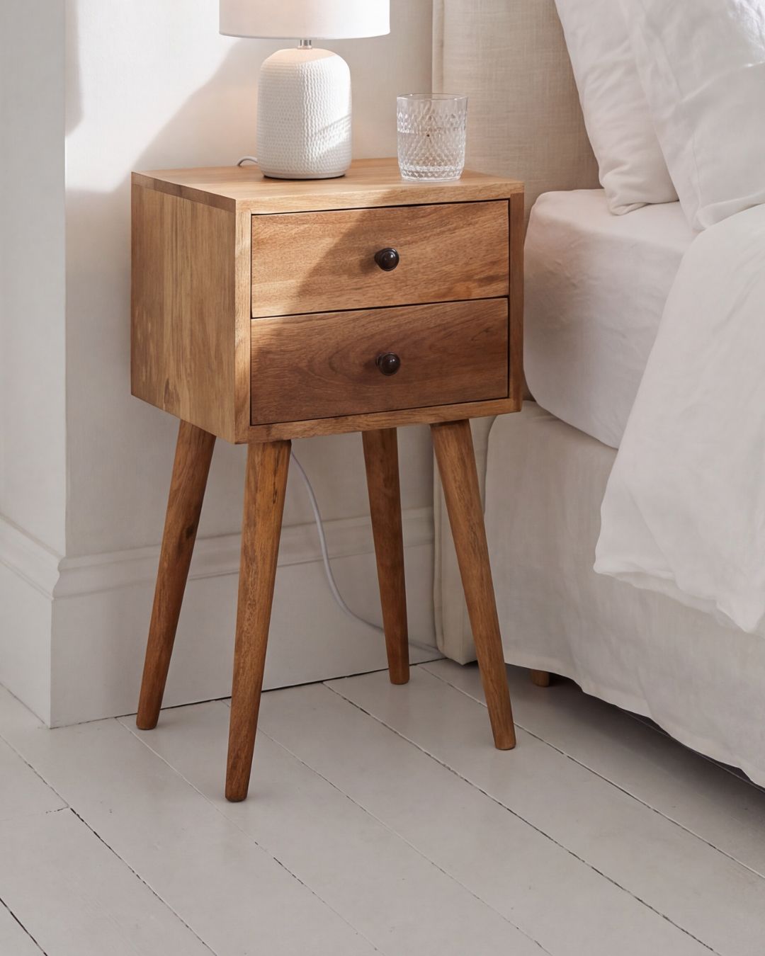 Joel handmade solid wood narrow bedside table with 2 drawers in natural finish