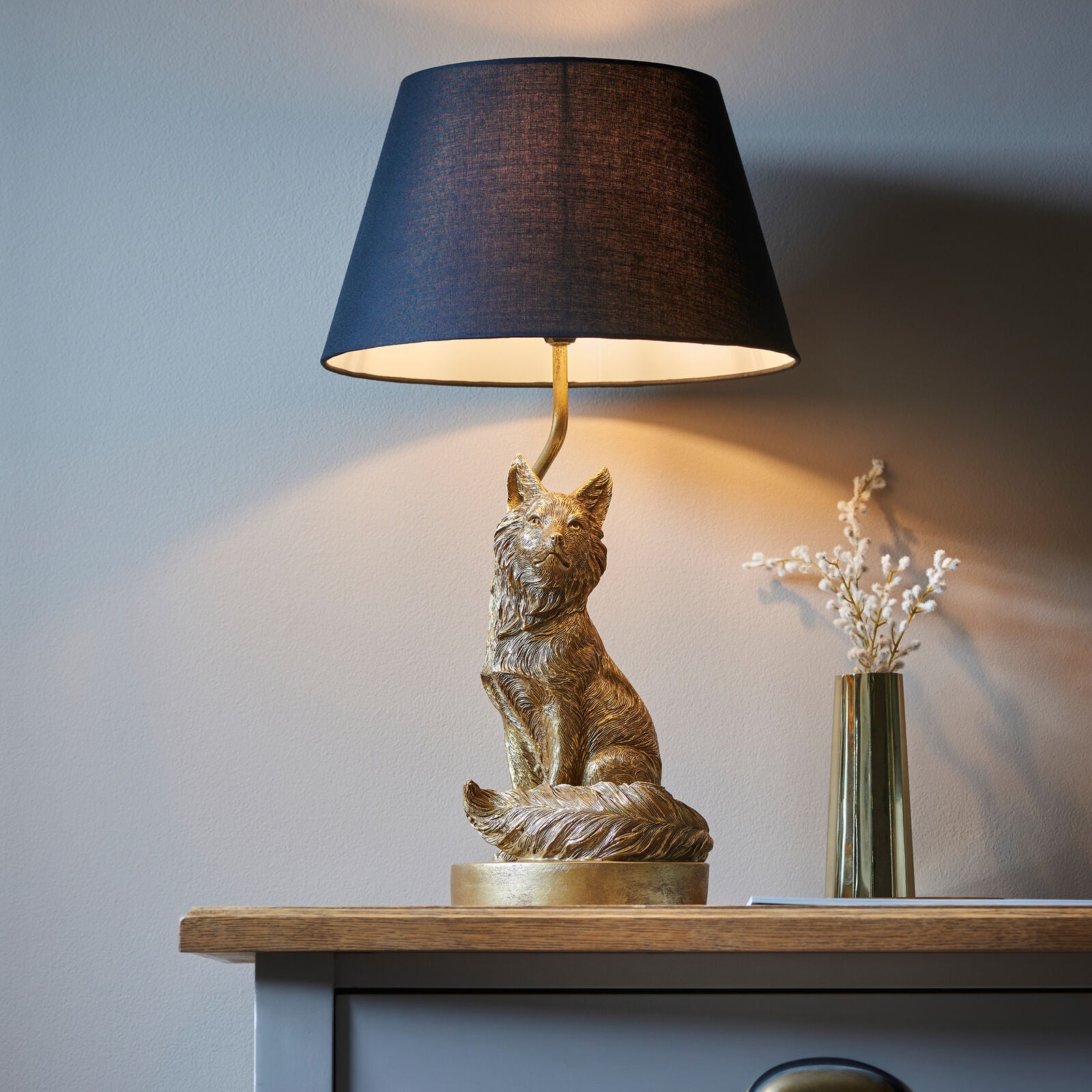 Basil Fox table lamp in vintage gold finish with black fabric shade | malletandplane.com