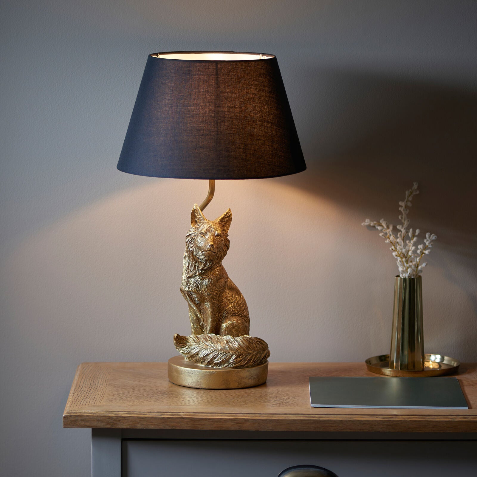 Basil Fox table lamp in vintage gold finish with black fabric shade | malletandplane.com