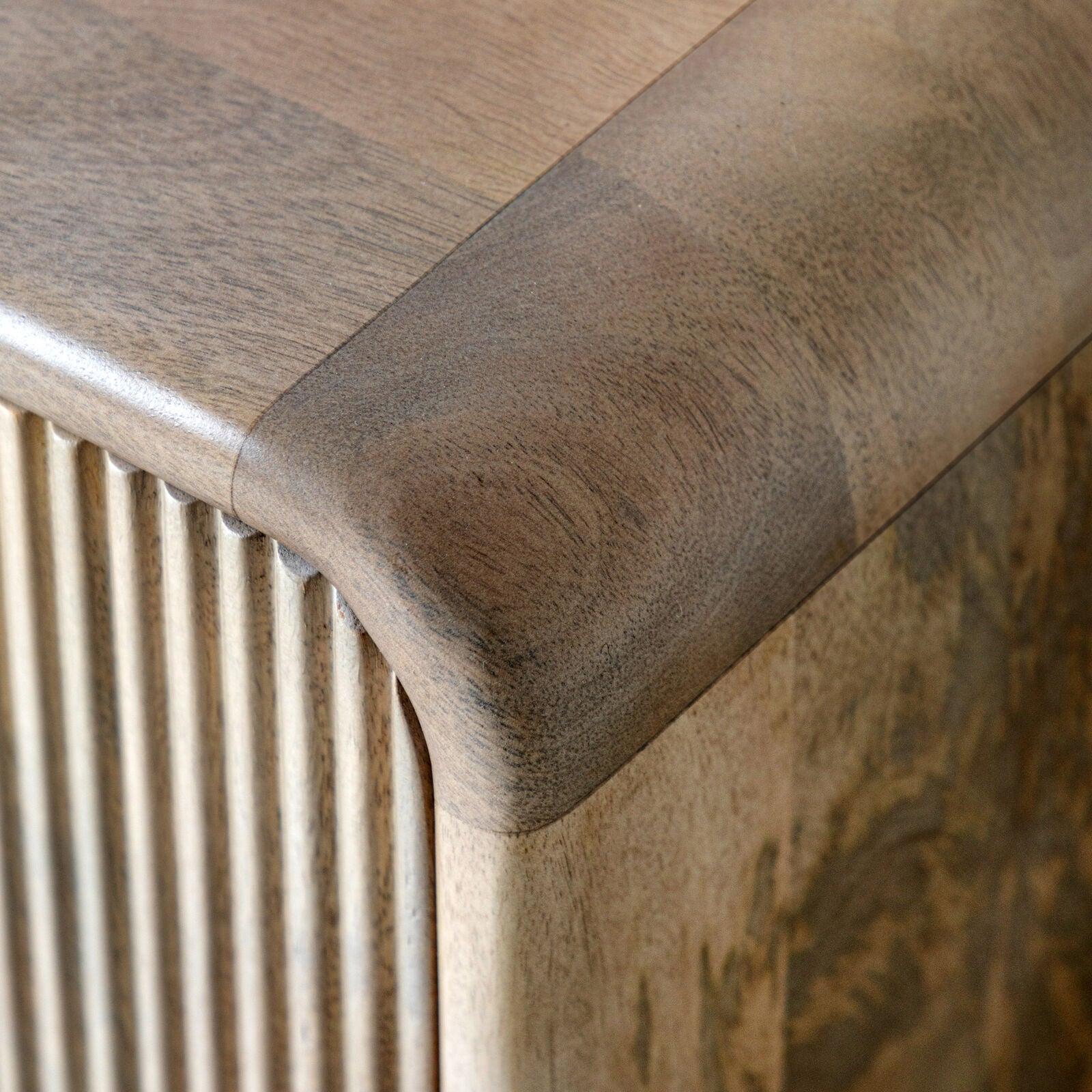 Rocca mango media unit with curved edges and fluted doors | malletandplane.com