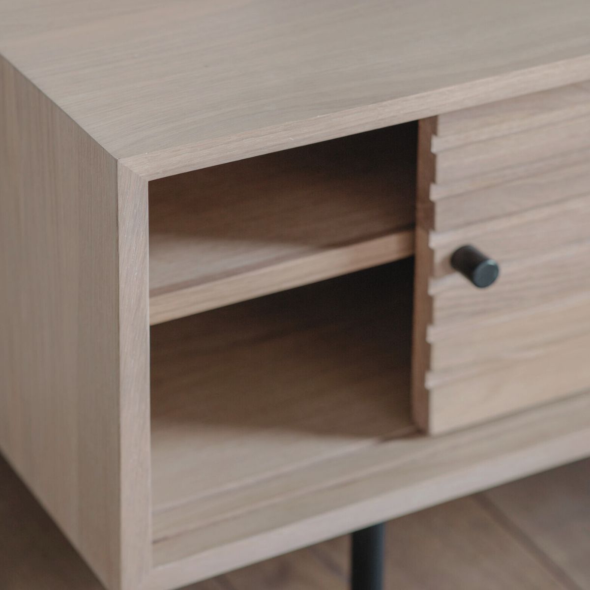 Soja oak and steel media unit with sliding doors and Japandi slatted detailing | malletandplane.com