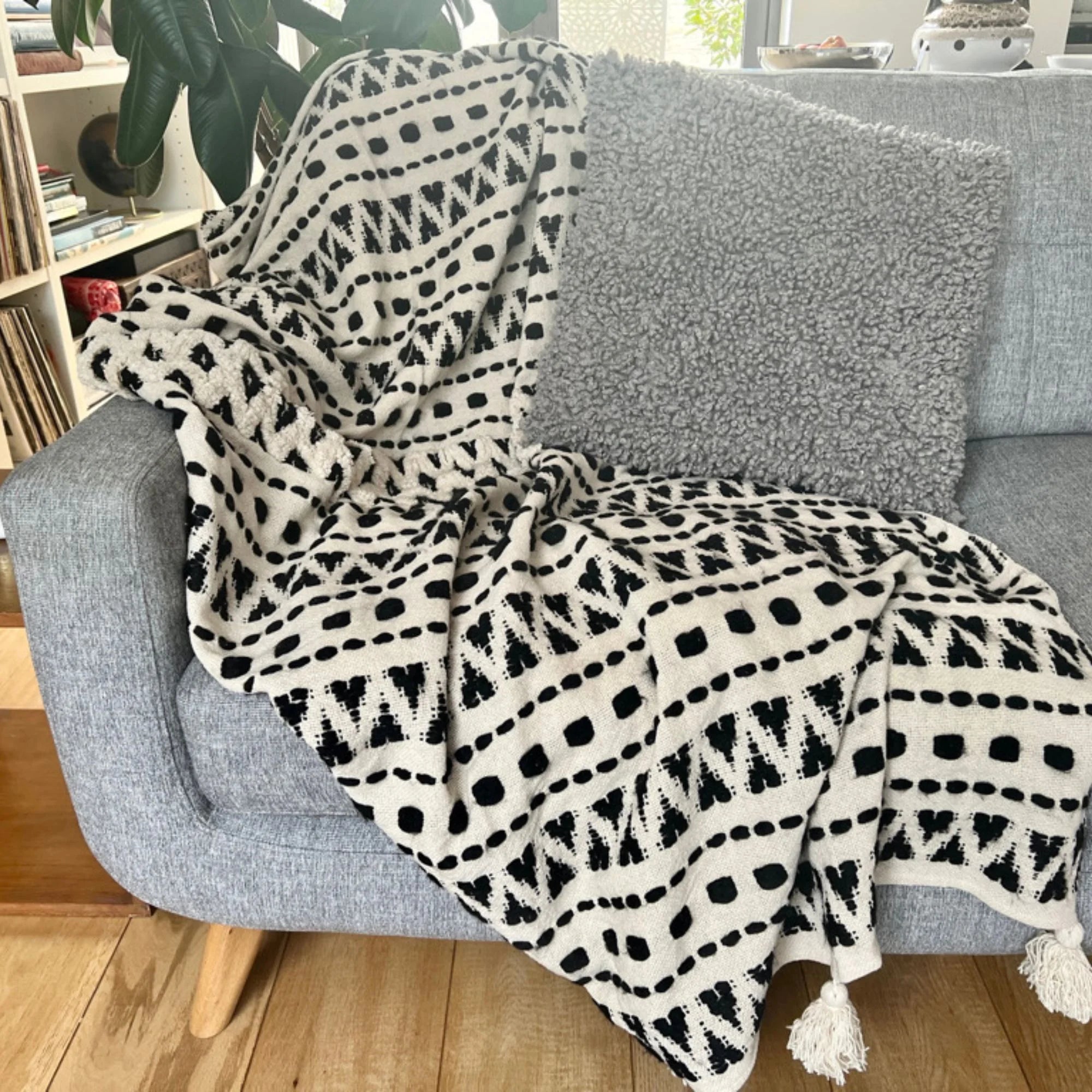 Aztec contemporary tufted cream throw with a beautiful black stitched aztec design | malletandplane.com