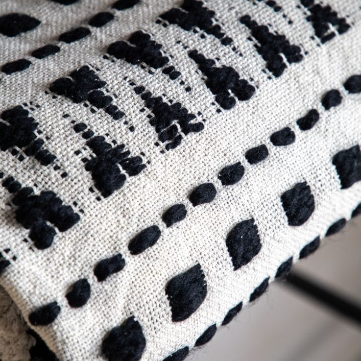 Aztec contemporary tufted cream throw with a beautiful black stitched aztec design | malletandplane.com