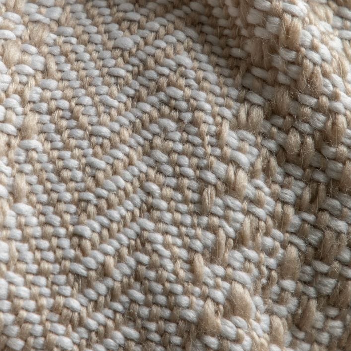 Lionel natural throw with neutral woven design and large wite tassels | malletandplane.com